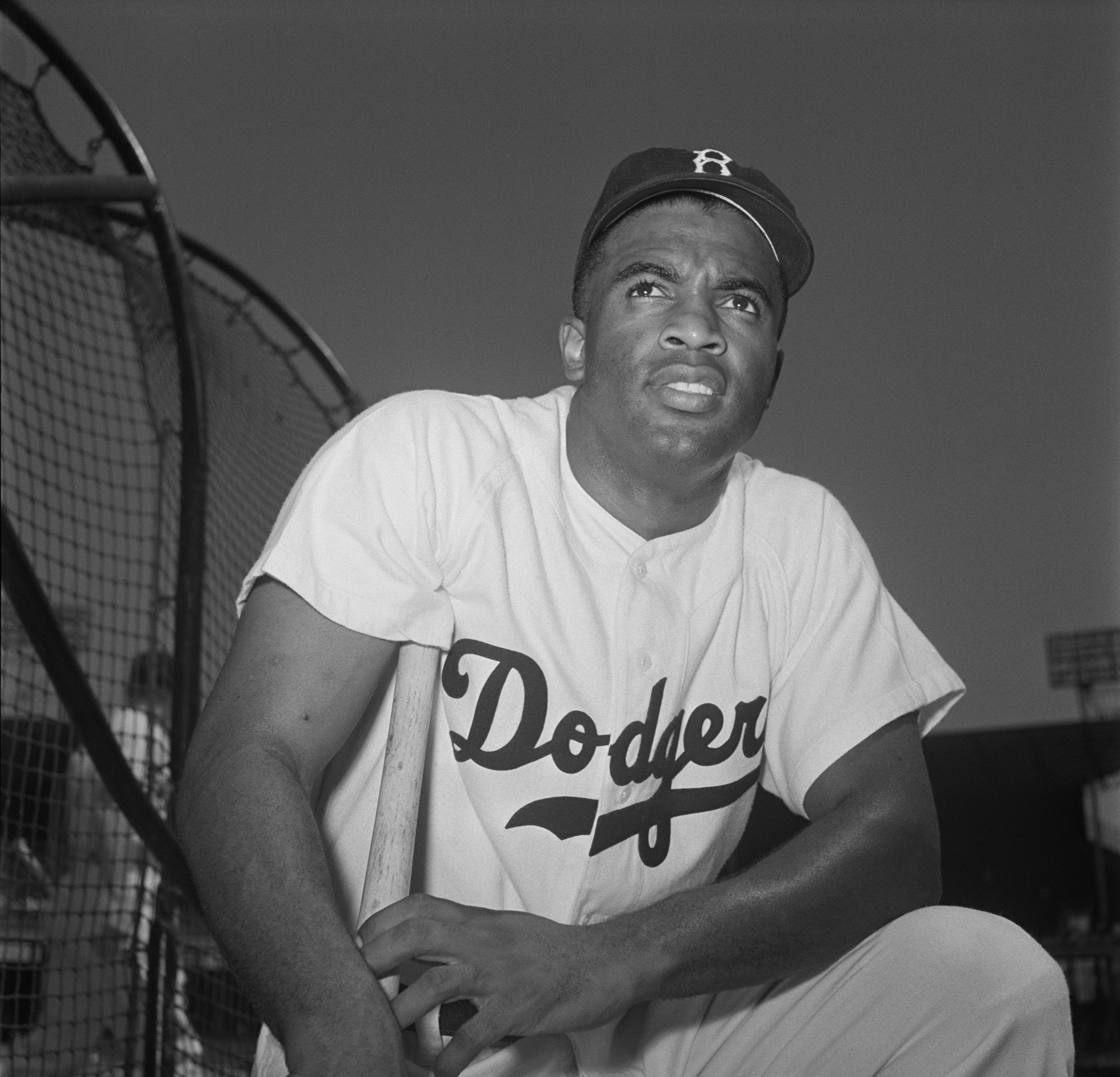 Jackie Robinson and wife seated at home. Photographed by Frank Bauman for Look magazine, 1949.